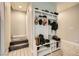 A mud room features a built-in storage bench, hat rack and hooks for organizing your entryway at 707 Cottonwood Hill Pl, Henderson, NV 89011
