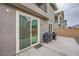 View of the patio area with concrete pavers and a sliding glass door into the home at 707 Cottonwood Hill Pl, Henderson, NV 89011