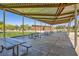 Covered outdoor pavilion with picnic tables, providing a comfortable gathering space at 707 Cottonwood Hill Pl, Henderson, NV 89011