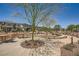 Landscaped picnic area with outdoor seating and walking paths for community residents at 707 Cottonwood Hill Pl, Henderson, NV 89011