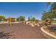 Community playground with swings, climbing structures and stone features promoting active recreation at 707 Cottonwood Hill Pl, Henderson, NV 89011