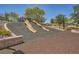 Community playground featuring two slides on a rubber surface for Gathering recreation at 707 Cottonwood Hill Pl, Henderson, NV 89011