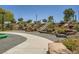 Community playground featuring three slides built into a landscaped hillside for Gathering enjoyment at 707 Cottonwood Hill Pl, Henderson, NV 89011
