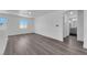 Inviting bedroom with wood-look floors and access to the en-suite bathroom at 720 Picasso Picture Ct, North Las Vegas, NV 89081