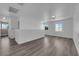 Spacious bonus room with wood-look flooring, recessed lighting and bright windows at 720 Picasso Picture Ct, North Las Vegas, NV 89081