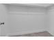 Bright closet features a clean, white interior, bar and shelf at 720 Picasso Picture Ct, North Las Vegas, NV 89081