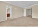 Spacious carpeted bedroom with attached bath and walk-in closet at 7505 Java Sparrow St, North Las Vegas, NV 89084