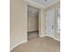 Entryway features tile floors, front door, and a window providing natural light at 7505 Java Sparrow St, North Las Vegas, NV 89084