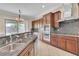 Gourmet kitchen boasts granite countertops, stainless steel appliances and custom cabinets at 7505 Java Sparrow St, North Las Vegas, NV 89084