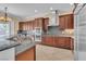 Gourmet kitchen boasts granite countertops, stainless steel appliances and custom cabinets at 7505 Java Sparrow St, North Las Vegas, NV 89084