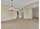 Bright and airy living room with a decorative chandelier and open layout at 7505 Java Sparrow St, North Las Vegas, NV 89084