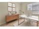 Modern office space featuring a sleek desk, ample storage, and natural light at 7505 Java Sparrow St, North Las Vegas, NV 89084