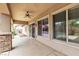 Covered outdoor patio with ceiling fan, with views of the pool area at 7505 Java Sparrow St, North Las Vegas, NV 89084
