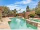 Sparkling pool and spa create a private backyard oasis for relaxation and recreation at 7505 Java Sparrow St, North Las Vegas, NV 89084