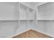 Walk-in closet with built-in shelving and plenty of room for storage at 7505 Java Sparrow St, North Las Vegas, NV 89084