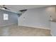 Bright living area featuring tile floors at 7609 Aubusson Ct, Las Vegas, NV 89149