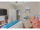 Tastefully decorated bedroom featuring beach-themed artwork and accents at 7669 Fieldfare Dr, North Las Vegas, NV 89084