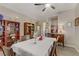 Bright dining room featuring wooden furnishings, light walls and floors at 7669 Fieldfare Dr, North Las Vegas, NV 89084