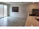 Spacious living room featuring tile flooring, recessed lighting, and natural light at 7672 Lush Oasis Ave, Las Vegas, NV 89113