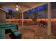 This covered outdoor patio features comfortable seating and a BBQ grill, perfect for relaxation at 7728 Whispering River St, Las Vegas, NV 89131