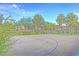 Community basketball court with well-maintained surface, providing a recreational space for residents and visitors at 7728 Whispering River St, Las Vegas, NV 89131
