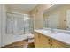 Nicely decorated bathroom featuring a shower-tub, neutral walls, and a single sink vanity at 7732 Almeria Ave, Las Vegas, NV 89128
