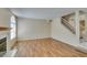 Large living room with wood floors, lots of light and fireplace at 7732 Almeria Ave, Las Vegas, NV 89128