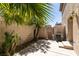 Private patio area featuring concrete flooring and a block wall providing intimacy at 7732 Almeria Ave, Las Vegas, NV 89128