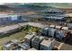 Aerial view of a neighborhood featuring modern townhomes and community green spaces at 8113 Misty Canyon Ave, Las Vegas, NV 89113