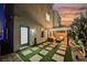 Inviting backyard with patio, pavers, and a cozy seating area at 8113 Misty Canyon Ave, Las Vegas, NV 89113