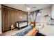 Stylish Bedroom with wood slat accent wall and designer details at 8113 Misty Canyon Ave, Las Vegas, NV 89113
