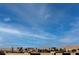 Breathtaking view of the Las Vegas skyline against a beautiful blue sky backdrop and mountain range at 8113 Misty Canyon Ave, Las Vegas, NV 89113
