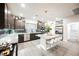 Open concept kitchen with seating and stainless steel appliances at 8113 Misty Canyon Ave, Las Vegas, NV 89113