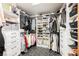 Spacious walk-in closet with custom shelving, drawers, and shoe racks at 8113 Misty Canyon Ave, Las Vegas, NV 89113