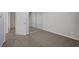 Bedroom with neutral walls and carpet and a mirrored closet at 8409 Insignia Ave # 102, Las Vegas, NV 89178