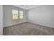 A serene bedroom features carpet, abundant natural light, and a relaxing atmosphere at 8409 Insignia Ave # 102, Las Vegas, NV 89178