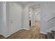 Warm entryway featuring wood floors and views into other rooms of the house at 8409 Insignia Ave # 102, Las Vegas, NV 89178