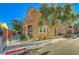 Attractive two-story home featuring an inviting facade and a well-manicured front yard at 8409 Insignia Ave # 102, Las Vegas, NV 89178