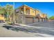 Charming townhome with attached garage, balcony, and lovely curb appeal at 8409 Insignia Ave # 102, Las Vegas, NV 89178