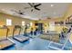 Community gym features treadmills, weights, machines, and ceiling fans at 8409 Insignia Ave # 102, Las Vegas, NV 89178
