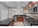 Well-equipped kitchen boasts an island, stainless appliances, and open layout at 8409 Insignia Ave # 102, Las Vegas, NV 89178