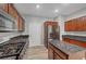 Well-equipped kitchen features stainless steel appliances, granite countertops, and ample storage at 8409 Insignia Ave # 102, Las Vegas, NV 89178