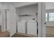 Convenient laundry room features a washer and dryer at 8409 Insignia Ave # 102, Las Vegas, NV 89178