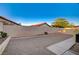 Low maintenance backyard featuring gravel landscaping, privacy walls and desert foliage at 8412 Mulcahy Ave, Las Vegas, NV 89145