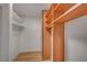 Walk-in closet with wood shelving and ample storage space at 8412 Mulcahy Ave, Las Vegas, NV 89145