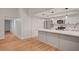 Spacious kitchen featuring stainless appliances, ample counter space, and neutral tones at 8412 Mulcahy Ave, Las Vegas, NV 89145