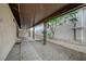 Spacious covered patio featuring gravel landscaping along the wall for relaxed outdoor living at 8412 Mulcahy Ave, Las Vegas, NV 89145