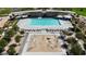 Overhead view of the community pool, splash pad, and surrounding lounge areas at 87 Serene Tempo Ave, Henderson, NV 89011
