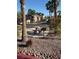 Outdoor picnic area in community featuring a charcoal grill and mature landscaping at 8805 Jeffreys St # 1112, Las Vegas, NV 89123