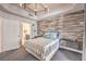 Bright bedroom features modern lighting fixture, and en suite bathroom at 91 E Agate Ave # 204, Las Vegas, NV 89123